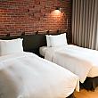 今回ナビはHOTELの2人部屋(友緻客房-2小床)をチョイス。シングルベッドが2台置かれたベーシックな個室タイプです。お友達との旅行にぴったり！