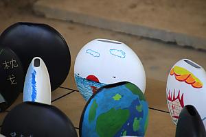 ガイドさんの碁石は海からの日の出を描いた作品！